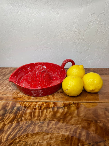 Red speckled citrus juicer